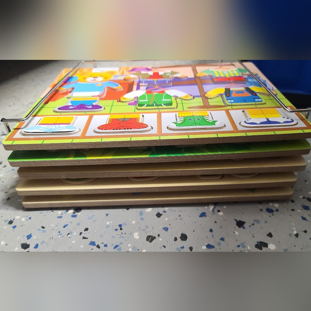 Set of 5 wooden puzzles with metal shelf